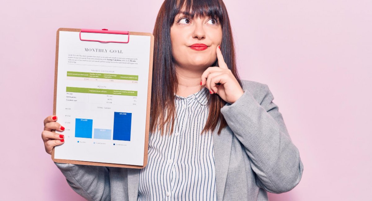 Woman holding a clipboard with chart information