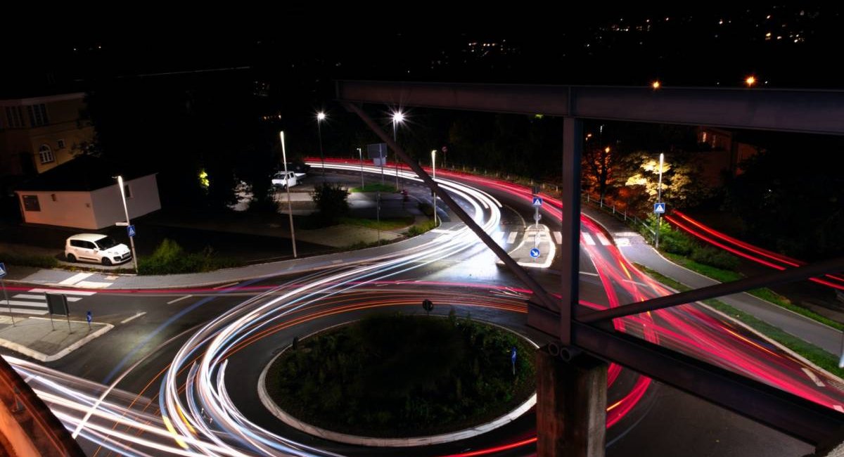 Project progress 1 Time-lapse photo of cars going around a traffic circle at night