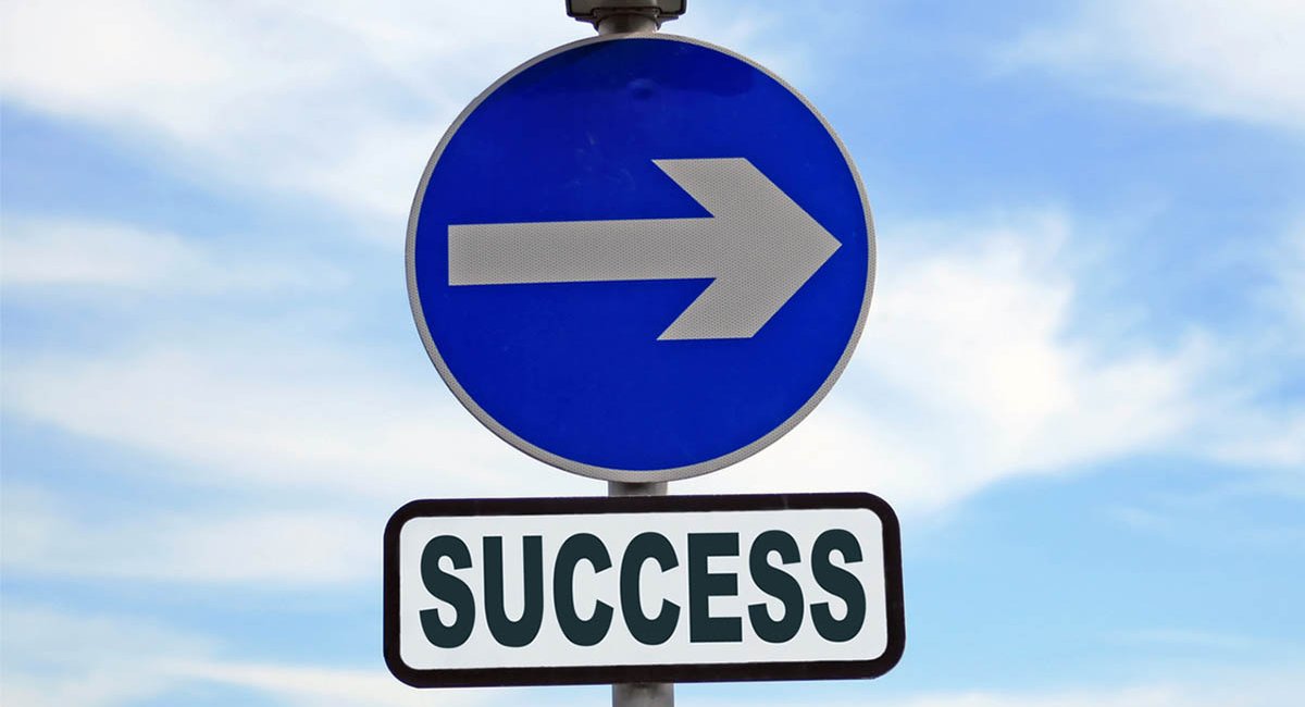 Success 3 Sign with arrow pointing right and the word "success" beneath it