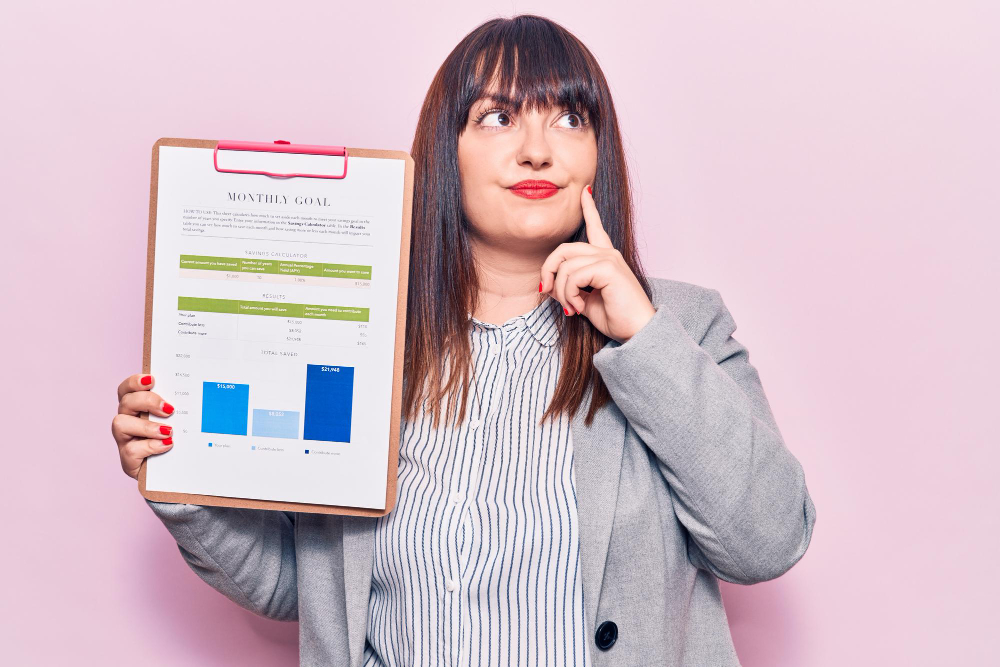 Woman holding a clipboard with chart information