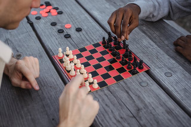 Two people playing a game of chess