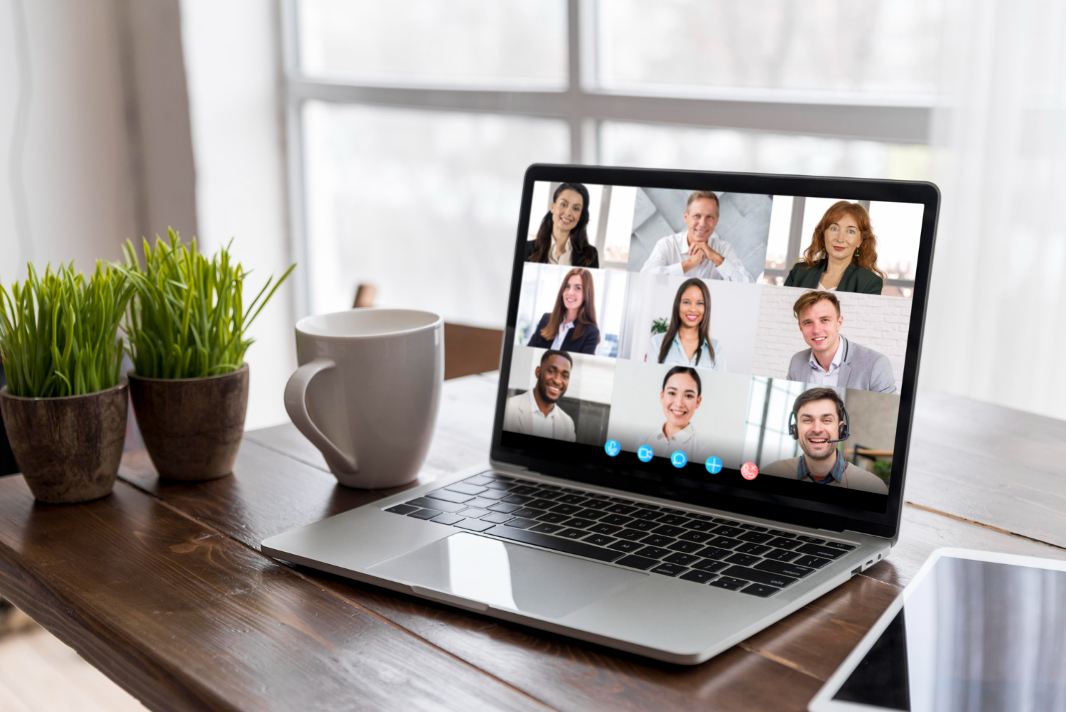 A business video call on a laptop