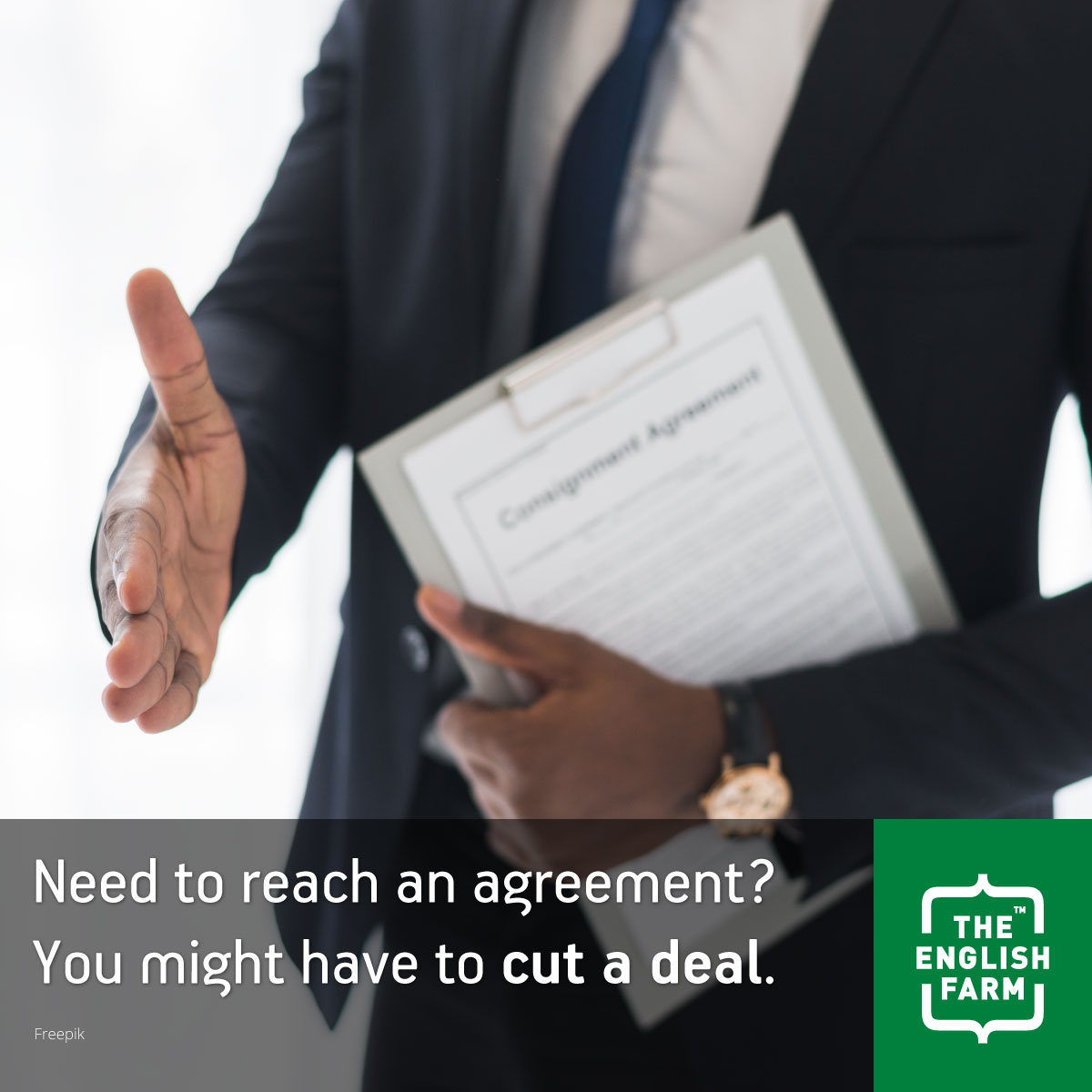 Man holding out his hand for a handshake to cut a deal