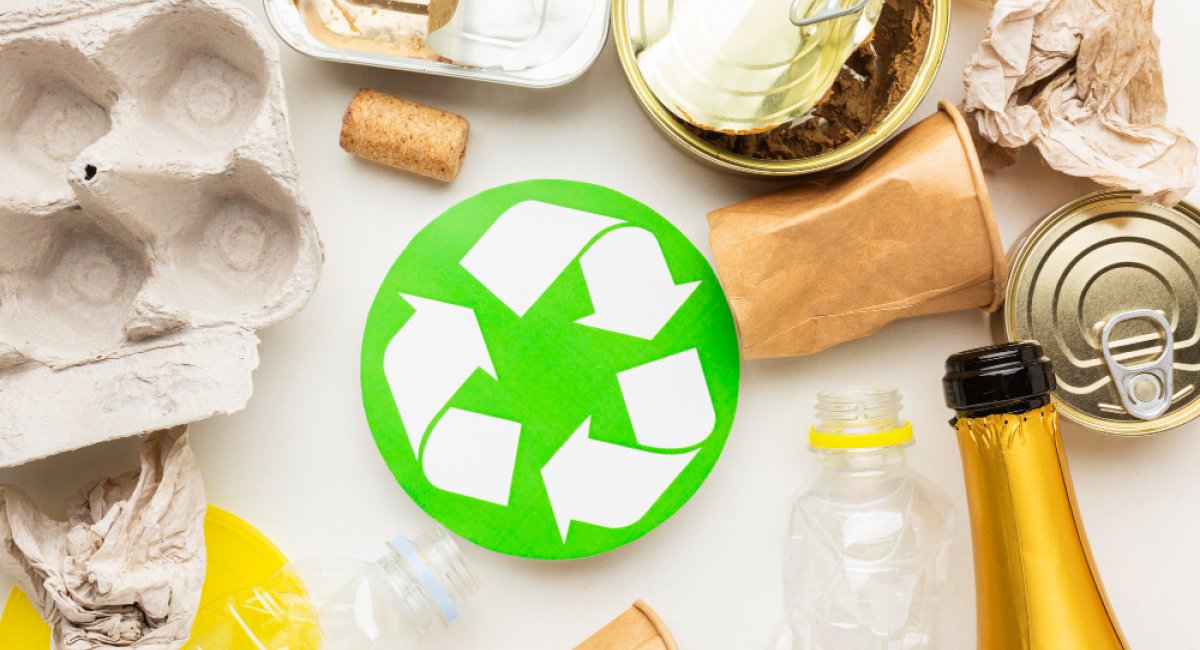 Empty comtainers with the recycling symbol in the centre