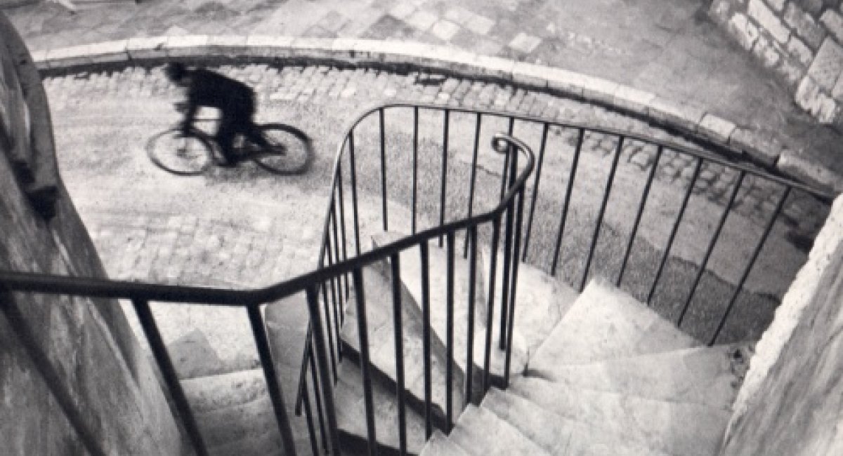 person bicycle stairs monotone grey