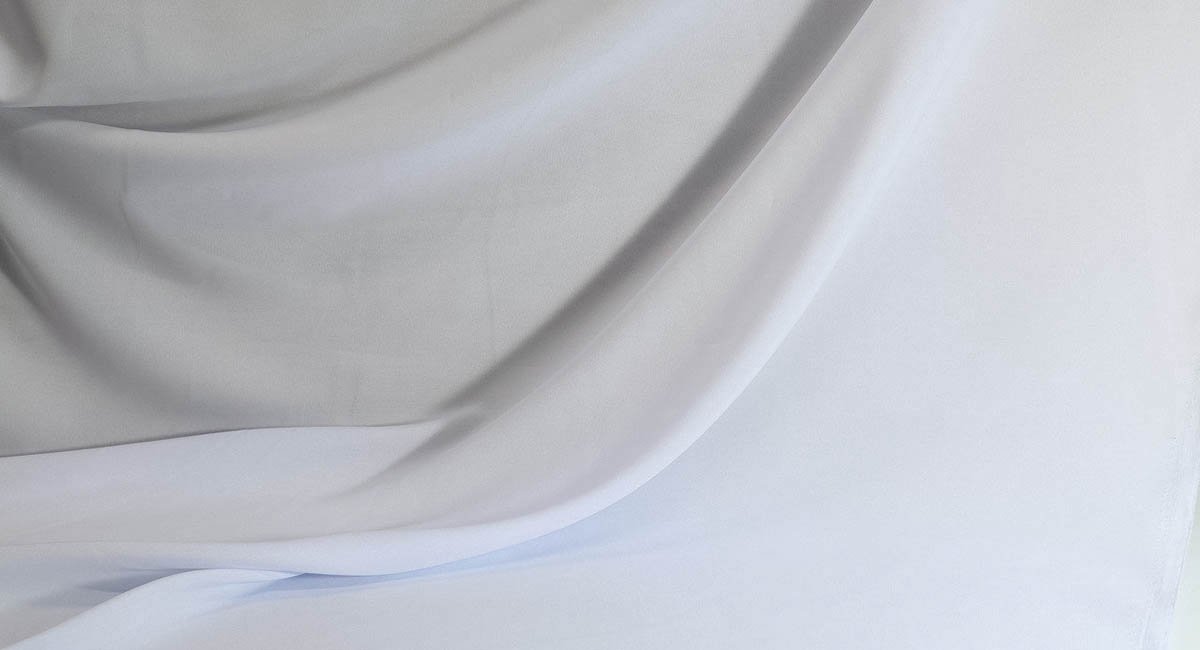 close-up of draped white silk
